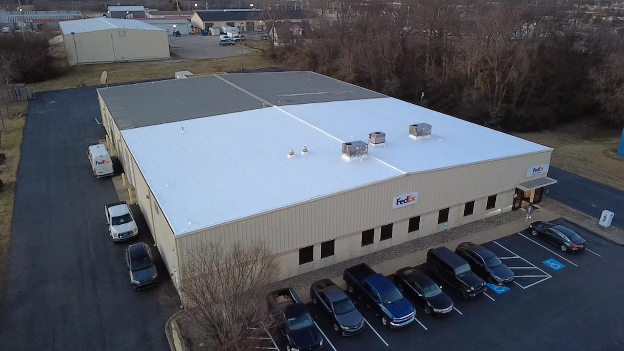 Aerial drone photo of the completed white membrane roof on the FedEx Ship Center in Bowling Green